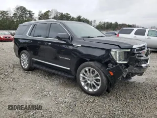 2023 GMC Yukon SLT with VIN 1GKS2BKD7PR122685, listed as a Copart auction lot 84611444 with 52,271 mi miles and Salvage Title. Bid and sale history available at carsss.com. Image 4.
