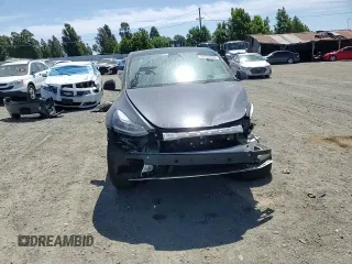 2024 Tesla Model Y Long Range z VIN 7SAYGDEE6RF032348, wystawiony jako Copart lot #58158355 z przebiegiem Nie podano mil oraz Szkoda całkowita • Salvage title. Historia ofert i sprzedaży dostępna na DreamBid. Obrazek 15.