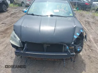 2005 Nissan Altima S z VIN 1N4AL11D95C140305, wystawiony jako IAAI lot #40028935 z przebiegiem Nie podano mil oraz . Historia ofert i sprzedaży dostępna na DreamBid. Obrazek 6.