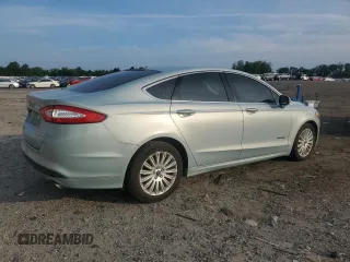 2013 Ford Fusion SE Hybrid z VIN 3FA6P0LU7DR368711, wystawiony jako Copart lot #62367685 z przebiegiem 155 284 mil mil oraz Czysty tytuł • Clean title. Historia ofert i sprzedaży dostępna na DreamBid. Obrazek 3.