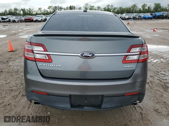 2014 Ford Taurus SE z VIN 1FAHP2D86EG143517, wystawiony jako Copart lot #51066975 z przebiegiem 134 892 mil mil oraz Szkoda całkowita • Salvage title. Historia ofert i sprzedaży dostępna na DreamBid. Obrazek 6.