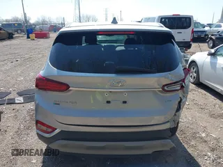 2020 Hyundai Santa Fe SEL with VIN 5NMS3CADXLH224352, listed as a IAAI auction lot 41912453 with 106,684 mi miles and . Bid and sale history available at DreamBid. Image 16.