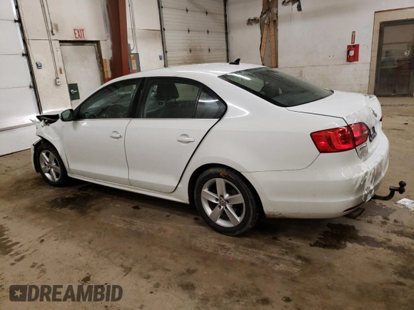 2014 Volkswagen Jetta TDI w/Premium with VIN 3VW3L7AJ3EM297108, listed as a Copart auction lot 81161134 with 160,656 mi miles and Salvage title. Bid and sale history available at DreamBid. Image 2.
