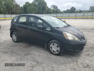 2009 Honda Fit with VIN JHMGE88249S068080, listed as a Copart auction lot 52469735 with 222,156 mi miles and Clean Title. Bid and sale history available at carsss.com. Image 4.