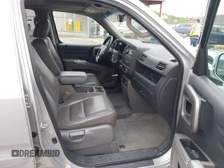 2012 Honda Ridgeline RTL with VIN 5FPYK1F58CB454385, listed as a IAAI auction lot 42212805 with 207,874 mi miles and . Bid and sale history available at DreamBid. Image 5.