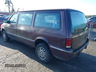 1993 Dodge Grand Caravan with VIN 1B4GK44R4PX675504, listed as a IAAI auction lot 42010737 with 219,886 mi miles and . Bid and sale history available at DreamBid. Image 6.