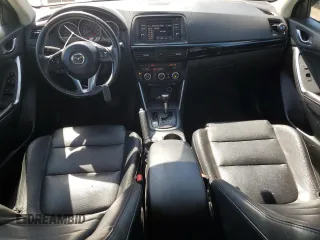 2014 Mazda CX-5 Grand Touring with VIN JM3KE4DY4E0305212, listed as a Copart auction lot 53145305 with 233,061 mi miles and Salvage Title. Bid and sale history available at carsss.com. Image 8.