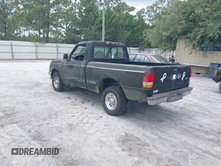 1997 Ford Ranger XLT with VIN 1FTCR10X1VUB67702, listed as a IAAI auction lot 42503161 with 142,432 mi miles and . Bid and sale history available at DreamBid. Image 3.