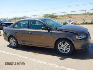 2014 Volkswagen Jetta S with VIN 3VW2K7AJ8EM319182, listed as a IAAI auction lot 42180101 with 133,495 mi miles and . Bid and sale history available at DreamBid. Image 13.