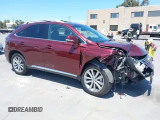 2015 Lexus RX 450h with VIN 2T2BC1BA8FC010233, listed as a IAAI auction lot 42526080 with 61,227 mi miles and . Bid and sale history available at DreamBid. Image 1.