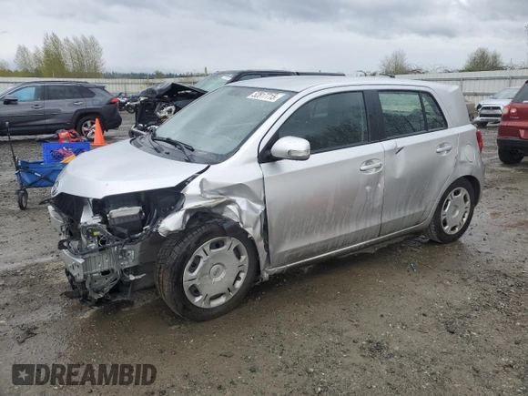 2011 Scion xD with VIN JTKKU4B44B1014235, listed as a Copart auction lot 52817715 with 96,941 mi miles and Salvage Title. Bid and sale history available at carsss.com. Image 1.