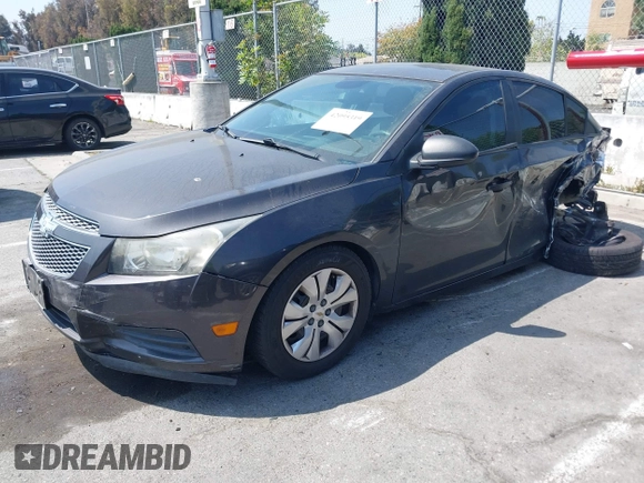 2014 Chevrolet Cruze LS z VIN 1G1PA5SG1E7405326, wystawiony jako IAAI lot #42095319 z przebiegiem Nie podano mil oraz . Historia ofert i sprzedaży dostępna na DreamBid. Obrazek 16.