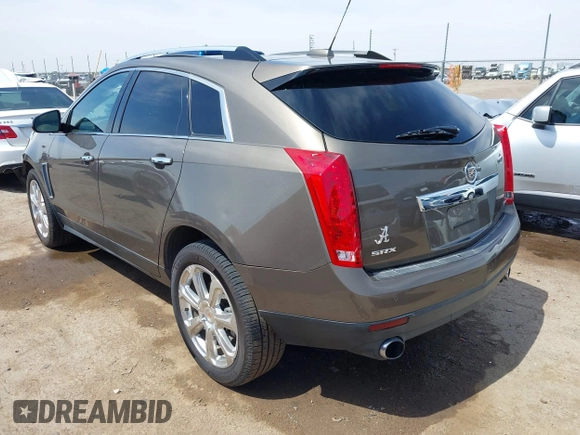 2016 Cadillac SRX Performance Collection z VIN 3GYFNCE39GS512286, wystawiony jako IAAI lot #42392467 z przebiegiem 95 708 mil mil oraz . Historia ofert i sprzedaży dostępna na DreamBid. Obrazek 3.
