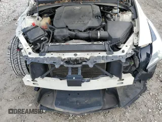 2014 Cadillac CTS Premium AWD with VIN 1G6AZ5S35E0156897, listed as a Copart auction lot 55838595 with 124,999 mi miles and Salvage title. Bid and sale history available at DreamBid. Image 11.