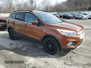 2017 Ford Escape SE with VIN 1FMCU0GD3HUC04513, listed as a Copart auction lot 47295575 with 147,938 mi miles and Salvage Title. Bid and sale history available at DreamBid. Image 4.