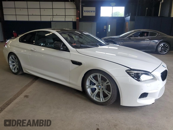 2014 BMW M6 z VIN WBSLX9C58ED160480, wystawiony jako Copart lot #64464985 z przebiegiem 58 514 mil mil oraz Czysty tytuł • Clean title. Historia ofert i sprzedaży dostępna na DreamBid. Obrazek 4.