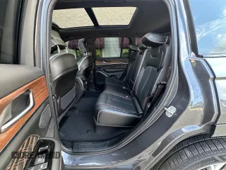 2023 Jeep Grand Cherokee Summit with VIN 1C4RJHEG2P8882566, listed as a Copart auction lot 65095905 with 59,970 mi miles and Salvage title. Bid and sale history available at DreamBid. Image 13.