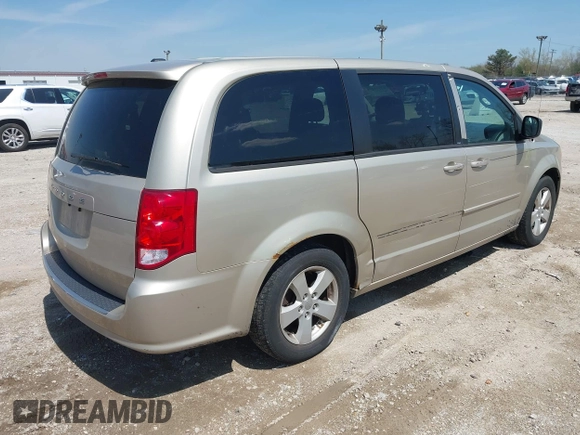 2013 Dodge Grand Caravan SE with VIN 2C4RDGBG9DR642162, listed as a IAAI auction lot 42113378 with 182,370 mi miles and . Bid and sale history available at DreamBid. Image 4.
