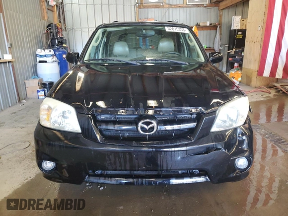 2005 Mazda Tribute S with VIN 4F2CZ06175KM24743, listed as a Copart auction lot 52815395 with 197,148 mi miles and Salvage Title. Bid and sale history available at carsss.com. Image 5.