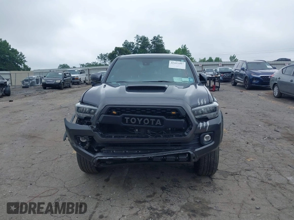 2022 Toyota Tacoma SR with VIN 3TMCZ5AN2NM507478, listed as a IAAI auction lot 42425907 with 40,796 mi miles and . Bid and sale history available at DreamBid. Image 13.
