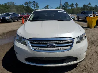 2011 Ford Taurus Limited with VIN 1FAHP2FW8BG141839, listed as a Copart auction lot 56594285 with 121,236 mi miles and Salvage title. Bid and sale history available at DreamBid. Image 5.