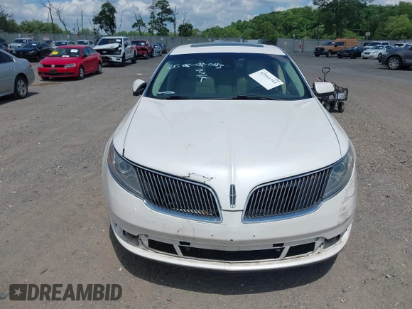 2013 Lincoln MKS EcoBoost with VIN 1LNHL9FT0DG606567, listed as a IAAI auction lot 42561162 with 285,830 mi miles and . Bid and sale history available at DreamBid. Image 12.