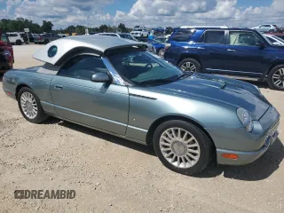 2004 Ford Thunderbird Pacific Coast Roadster with VIN 1FAHP63A04Y108766, listed as a Copart auction lot 74766964 with 30,107 mi miles and Salvage Title. Bid and sale history available at DreamBid. Image 4.