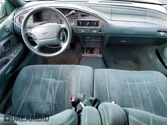 1994 Ford Taurus with VIN 1FALP5747RG236623, listed as a Copart auction lot 85242504 with 205,550 mi miles and Salvage title. Bid and sale history available at DreamBid. Image 8.