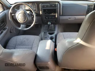 1997 Jeep Cherokee Sport with VIN 1J4FT68S9VL547391, listed as a Copart auction lot 70447484 with 250,171 mi miles and Salvage Title. Bid and sale history available at carsss.com. Image 8.