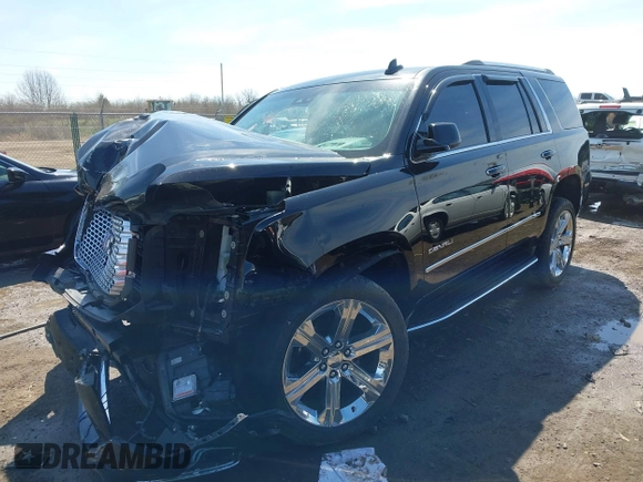 2017 GMC Yukon Denali with VIN 1GKS2CKJ0HR185365, listed as a IAAI auction lot 41856187 with 107,641 mi miles. Bid and sale history available at carsss.com. Image 2.