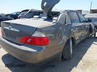 2004 Toyota Avalon XL z VIN 4T1BF28B24U345341, wystawiony jako IAAI lot #41998280 z przebiegiem Nie podano mil oraz . Historia ofert i sprzedaży dostępna na DreamBid. Obrazek 4.