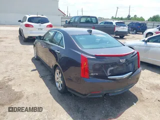2015 Cadillac ATS Sedan Luxury RWD with VIN 1G6AB5RAXF0128099, listed as a IAAI auction lot 42133919 with 152,191 mi miles. Bid and sale history available at carsss.com. Image 3.