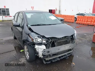 2015 Toyota Yaris L with VIN VNKKTUD38FA043393, listed as a IAAI auction lot 41573010 with 107,146 mi miles and . Bid and sale history available at DreamBid. Image 6.