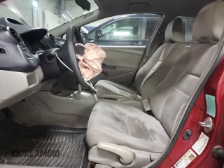 2010 Honda Insight LX with VIN JHMZE2H52AS034613, listed as a Copart auction lot 52701795 with 232,541 mi miles and Salvage Title. Bid and sale history available at DreamBid. Image 7.