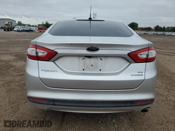 2013 Ford Fusion SE Hybrid с VIN 3FA6P0LU9DR233472, выставлен на аукционе Copart как лот 57994345 с пробегом 194 862 миль миль и Списание • Salvage title. История ставок и продаж доступна на DreamBid. Изображение 6.