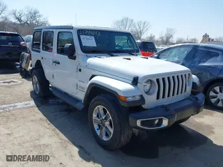 2020 Jeep Wrangler Unlimited Sahara with VIN 1C4HJXEN7LW180589, listed as a IAAI auction lot 41784143 with 58,955 mi miles. Bid and sale history available at carsss.com. Image 1.