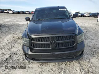 2015 Ram 1500 Express with VIN 3C6RR6KT4FG687339, listed as a Copart auction lot 48102595 with 164,111 mi miles and Salvage title. Bid and sale history available at DreamBid. Image 5.