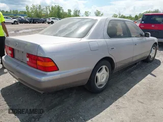 1998 Lexus LS 400 with VIN JT8BH28F1W0101562, listed as a IAAI auction lot 42263258 with 82,090 mi miles and . Bid and sale history available at DreamBid. Image 4.