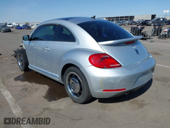 2013 Volkswagen Beetle 2.5L w/Sun/Sound/Nav with VIN 3VWJX7AT5DM606119, listed as a IAAI auction lot 41970253 with 81,004 mi miles and . Bid and sale history available at DreamBid. Image 3.