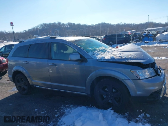 2018 Dodge Journey Crossroad with VIN 3C4PDDGG2JT499143, listed as a IAAI auction lot 41311128 with 73,161 mi miles and . Bid and sale history available at DreamBid. Image 12.