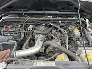 2008 Jeep Wrangler X with VIN 1J4FA24168L582227, listed as a Copart auction lot 58219065 with 98,284 mi miles and Salvage title. Bid and sale history available at DreamBid. Image 7.