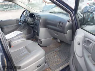 2007 Dodge Grand Caravan SXT with VIN 2D4GP44L37R356984, listed as a IAAI auction lot 41475361 with 153,843 mi miles. Bid and sale history available at carsss.com. Image 5.