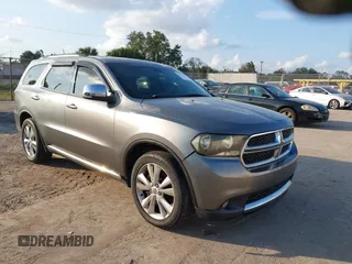 2011 Dodge Durango Crew with VIN 1D4SD4GT0BC630240, listed as a IAAI auction lot 41494046 with 174,343 mi miles and . Bid and sale history available at DreamBid. Image 1.