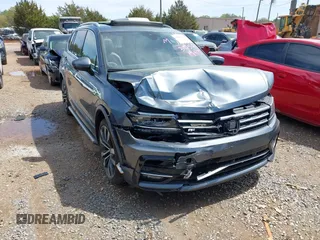 2018 Volkswagen Tiguan SEL Premium with VIN 3VV5B7AX4JM201579, listed as a IAAI auction lot 41932201 with 118,728 mi miles and . Bid and sale history available at DreamBid. Image 1.
