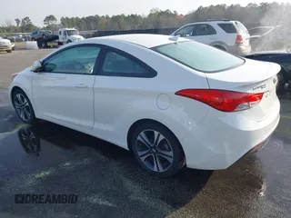 2013 Hyundai Elantra Coupe SE with VIN KMHDH6AE3DU010717, listed as a IAAI auction lot 41832406 with 232,929 mi miles. Bid and sale history available at carsss.com. Image 3.