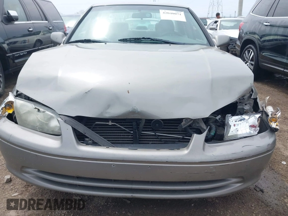 2001 Toyota Camry CE with VIN 4T1BG22K01U060588, listed as a IAAI auction lot 42040071 with 165,446 mi miles and . Bid and sale history available at DreamBid. Image 12.