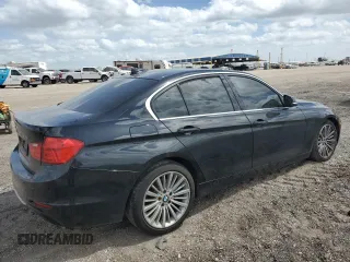 2013 BMW 3 Series 328i xDrive with VIN WBA3B3C51DF537704, listed as a Copart auction lot 49655625 with 98,384 mi miles and Salvage Title. Bid and sale history available at DreamBid. Image 3.