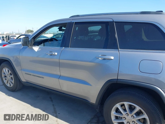 2021 Jeep Grand Cherokee Laredo E with VIN 1C4RJEAG6MC719089, listed as a IAAI auction lot 39290041 with 44,726 mi miles and . Bid and sale history available at DreamBid. Image 14.