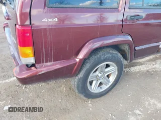 2000 Jeep Cherokee Classic with VIN 1J4FF58S7YL122676, listed as a IAAI auction lot 41710310 with 124,758 mi miles. Bid and sale history available at carsss.com. Image 6.