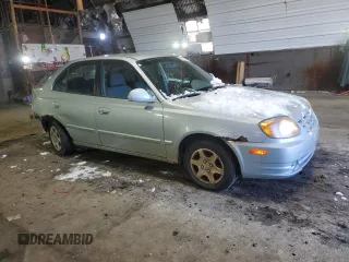 2005 Hyundai Accent GLS with VIN KMHCG45C15U602419, listed as a Copart auction lot 47759675 with 58,133 mi miles and Salvage Title. Bid and sale history available at carsss.com. Image 4.